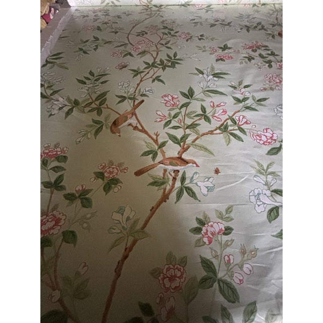 14.75 yards of gorgeous traditional chintz fabric featuring a limo green background with trees, flowers and birds....