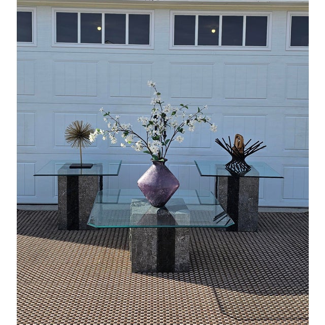 Exceptional vintage Maitland-Smith tessellated stone and glass table set, featuring sculptural bases paired with thick...
