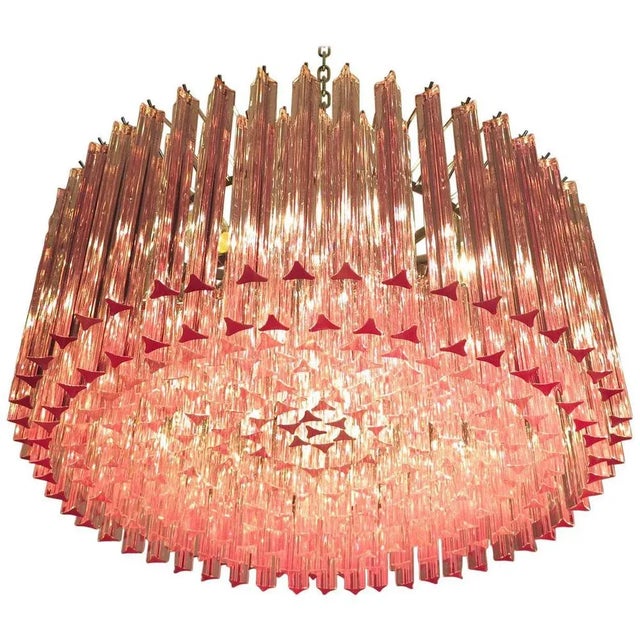 Triedri Murano glass chandelier, 265 pink prism A magnificent Murano glass chandelier, 265 pink triedri on crome frame....