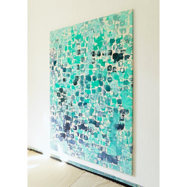 Studio towels were wrapped over four small cobblestones, and used to make imprints on a cotton canvas. This is part of the...