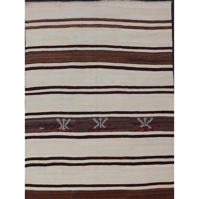 Turkish vintage flat-weave in shades of brown and ivory with stripe design with Minimalist design and stripes. Keivan...