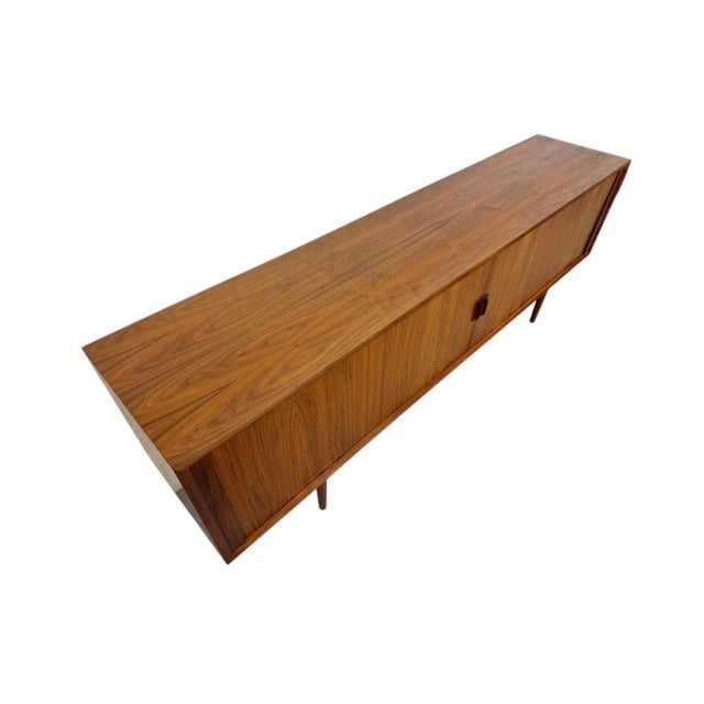Beautiful vintage Danish Modern teak credenza manufactured by the renowned Faarup Møbelfabrik of Denmark, circa 1960s!...