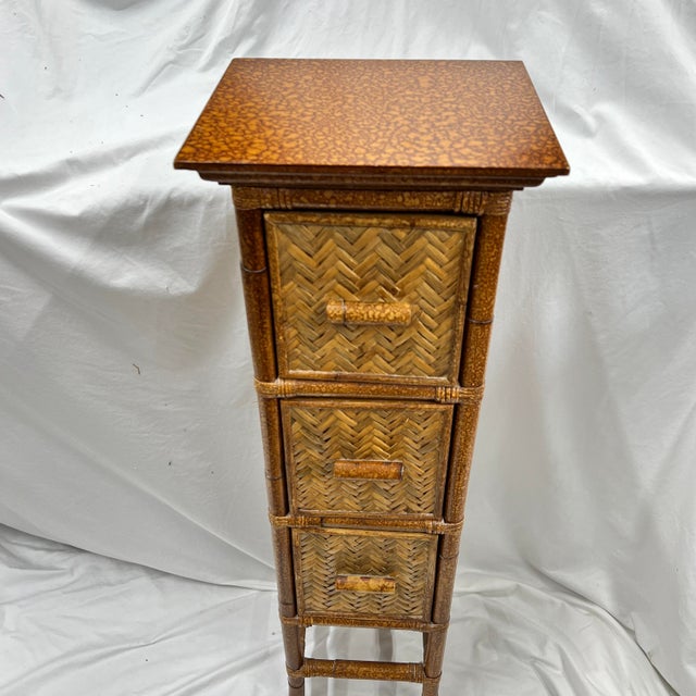 Bamboo and woven rattan slim chest of drawers. Perfect for small spaces where you need storage. Measures , overall at the...