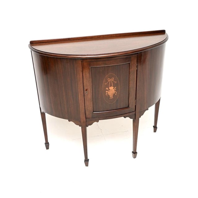A wonderful antique Edwardian inlaid cabinet. This was made in England, it dates from 1900-1910. It is of superb quality...