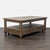 Three drawer table with shelf and plank top. Dimensions (in): 50W x 28D x 18H.