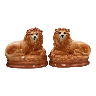 Pair of English Staffordshire Hand-Painted Lions With Glass Eyes, Circa 1900 For Sale