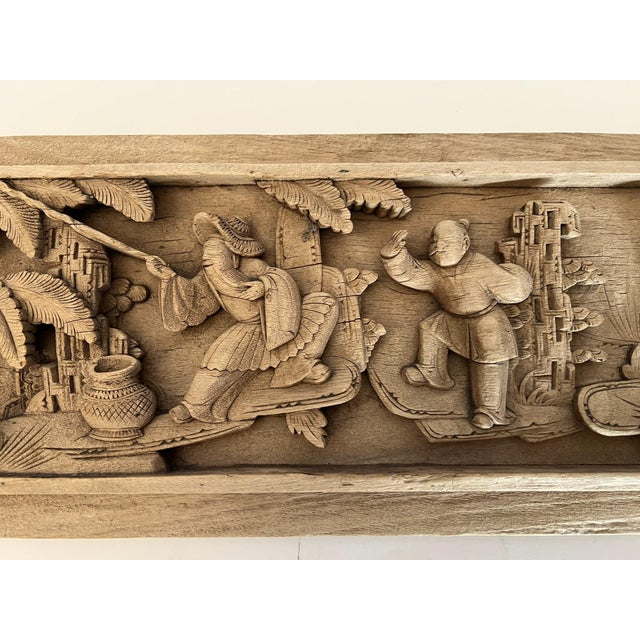 The small wood panel is a small piece of architectural artifact. It was once an inset from a tall wood panel, one of a set...