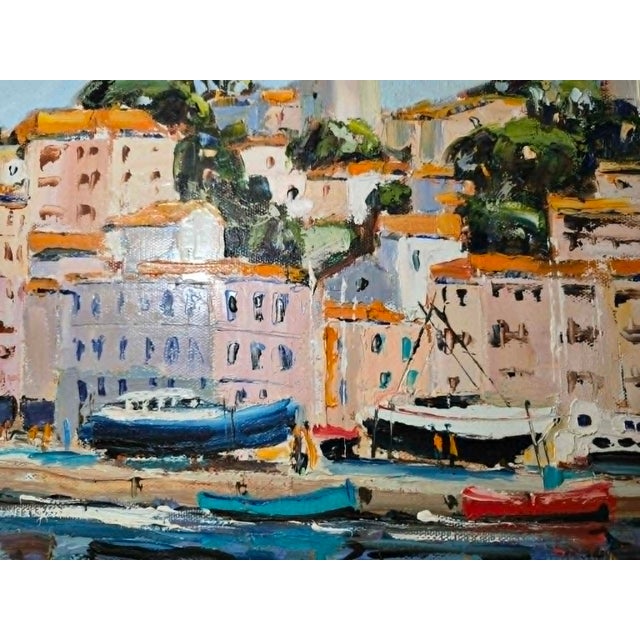 Acrylic on canvas depicting a view of the port of Saint-Tropez, signed R. Constant, a French artist renowned for his...