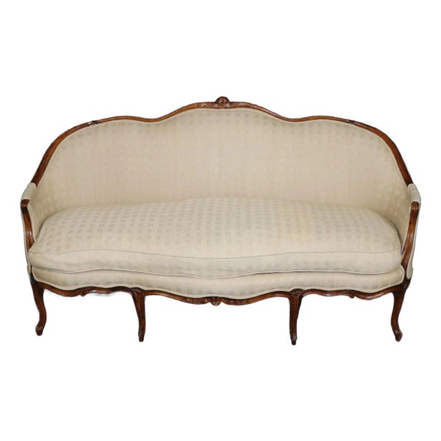 Refined and Chic French Louis XV Carved Walnut Settee Sofa Canape Circa 1920 For Sale