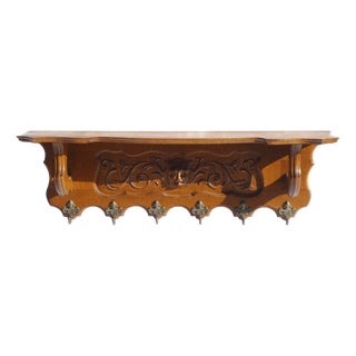 Antique Carved Wood Wall Shelf with Brass Angel Hooks For Sale