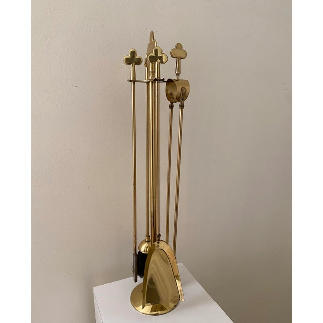 This unique and one of a kind vintage brass fireplace tool set is the perfect addition to any MCM home. Made in England,...