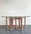This striking vintage dining table captures the essence of elevated coastal modernism, designed in the iconic style of...