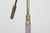 GINO SARFATTI Floor lamp model 1003, enameled metal, brass, painted aluminum, opaline. Produced by Arteluce, circa 1950....