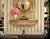 Presenting a sublime vintage Dorothy Draper Regency style wall mounted shelf with gold gilt acanthus leaf detail and...