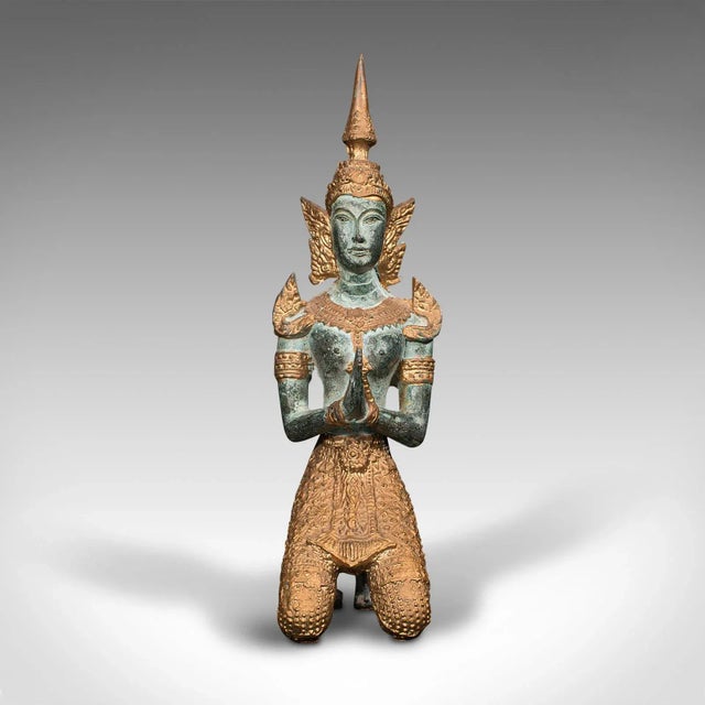 This is a vintage decorative prayer figure. An Oriental, gilt bronze statue of a Thai deity, dating to the late Art Deco...