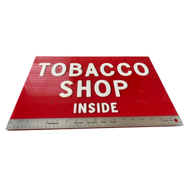 Bold, graphic, and unmistakably retro—this vintage “Tobacco Shop Inside” sign is a slice of mid-century Americana. With...