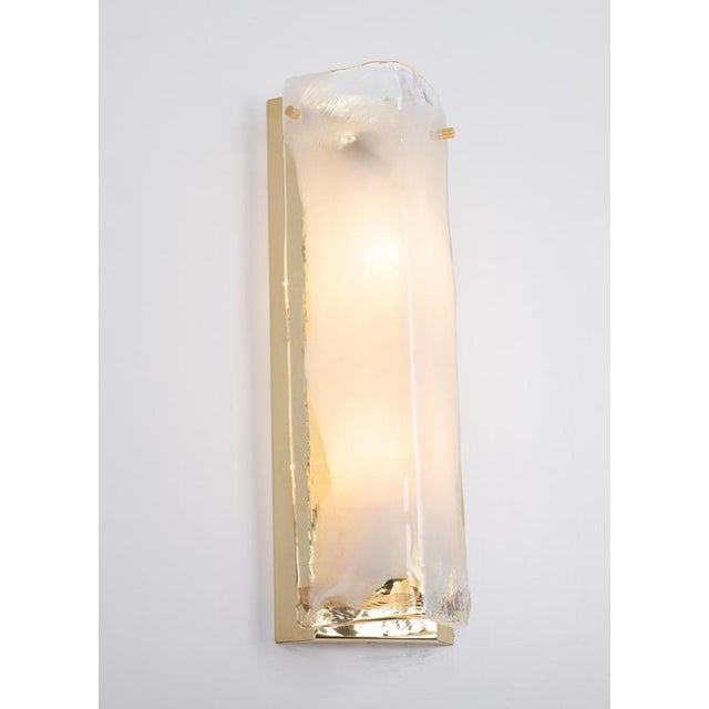 1 of 3 exceptional mid-century modern wall sconces by kalmar, austria, manufactured circa 1960s. Featuring beautifully...