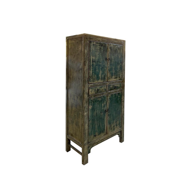 Standing Storage Cabinet. This unique piece boasts a striking two-tone finish with a warm light olive rim and vibrant teal...