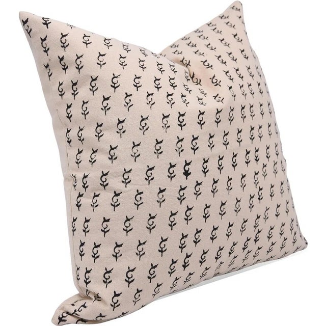 The Trimab cushion cover blends traditional craftsmanship with bold geometric charm, featuring a hand block printed design...