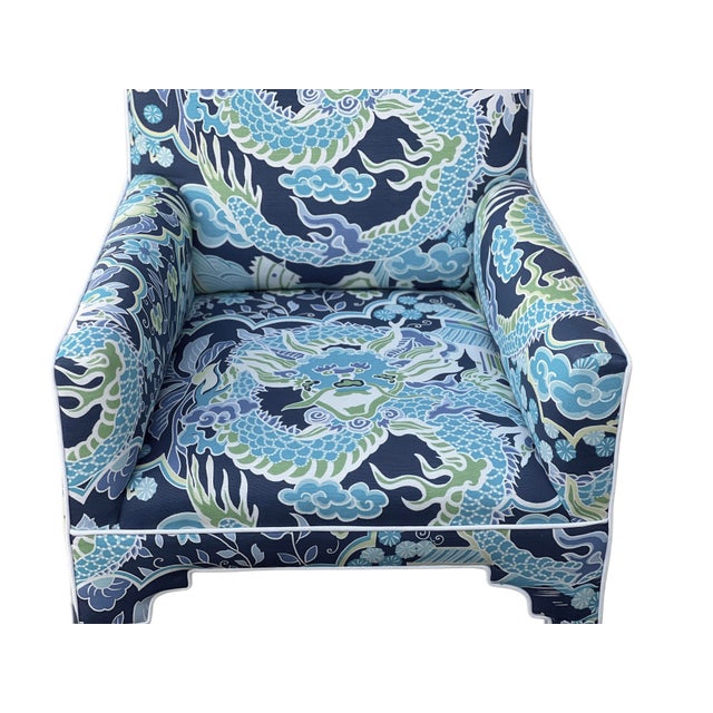 Pair of Mid Century Ming style armchairs, fully upholstered in Thibaut's vibrant 'Imperial Dragon' linen fabric, featuring...