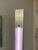 Rudi Stern for George Kovacs Neon Light Brushed stainless steel floor lamp with angled neon lighting. The light stands...