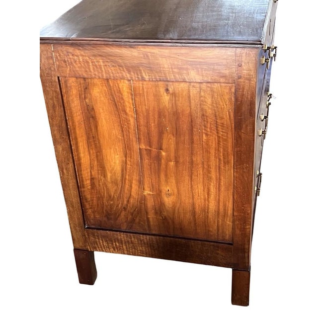 Louis XVI chest of drawers hand-made in France in the late 1700s using walnut and decorated with simple ebonized trim and...