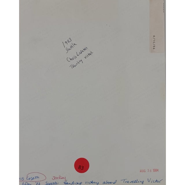 1984 black and white equestrian photograph of jockey Chris Loseth (Canadian, born 1955) after he won the 1983 Seattle,...