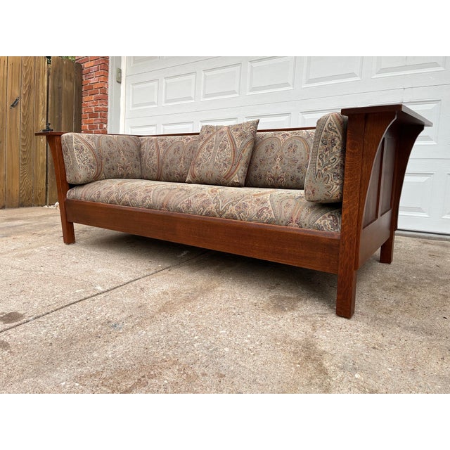 A stunning sofa based on 1910's L & JG Stickley's iconic sofa design. Solid quartersawn Oak framing creates an immensely...