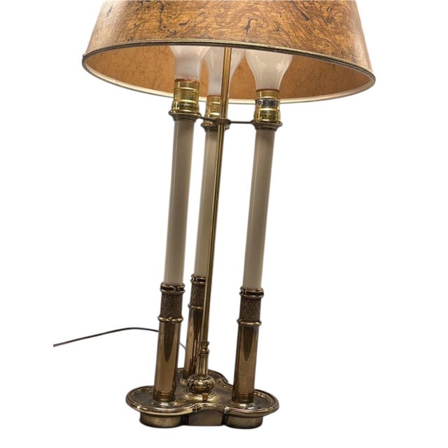 The Stiffel Bouillotte Tri-Candlestick Lamp is a stylish Mid-Century Modern piece with an adjustable height and a faux...