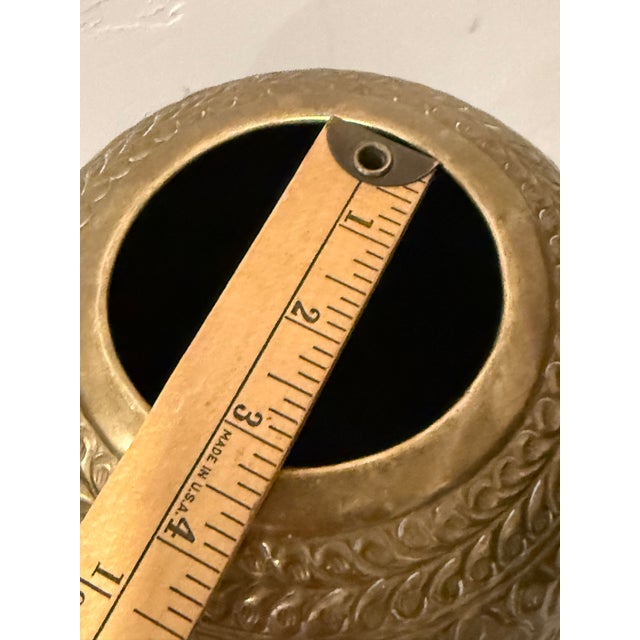 This decorative vase is strikingly shining golden appearance, the vase is truly one of a kind and sure to steal all the...