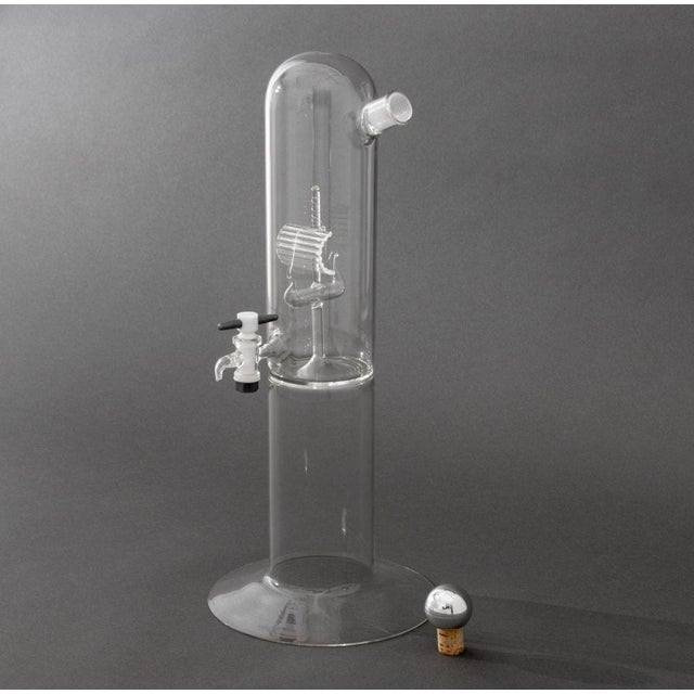 Alexander Society "Il Tubino" Glass Decanter and Dispenser, with silver-tone and cork stopper and glass ship design to the...