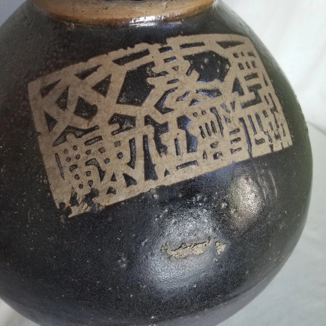 Used to make grain-based spirits, this jar with a unique shape would be a wonderful accent piece in your home! These jars...