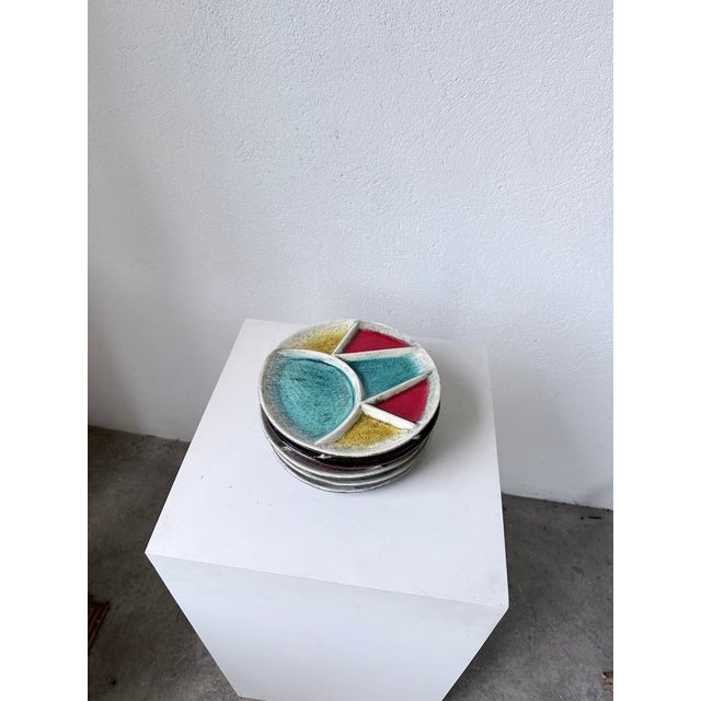 Set of 5 ceramic plates by Hugo Kohler, Swiss, signed on the back. We love the overall color scheme and the different...