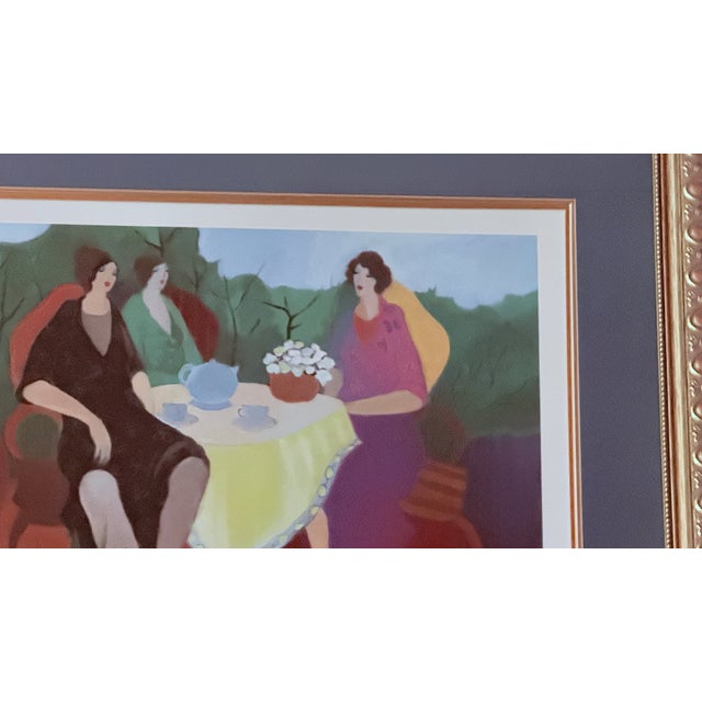 Seriolithograph in color on paper by Itzchak Tarkay titled Morning Social. Contemporary figurative print executed using...