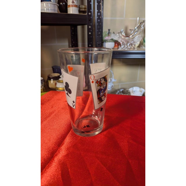A complete set of eight vintage pint glasses featuring full‑color face cards — Kings, Queens, and Jacks from all four...