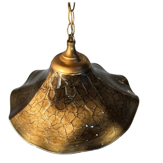 This exquisite pendant light is a true statement piece, meticulously crafted from hand-blown glass by the renowned Krosno...