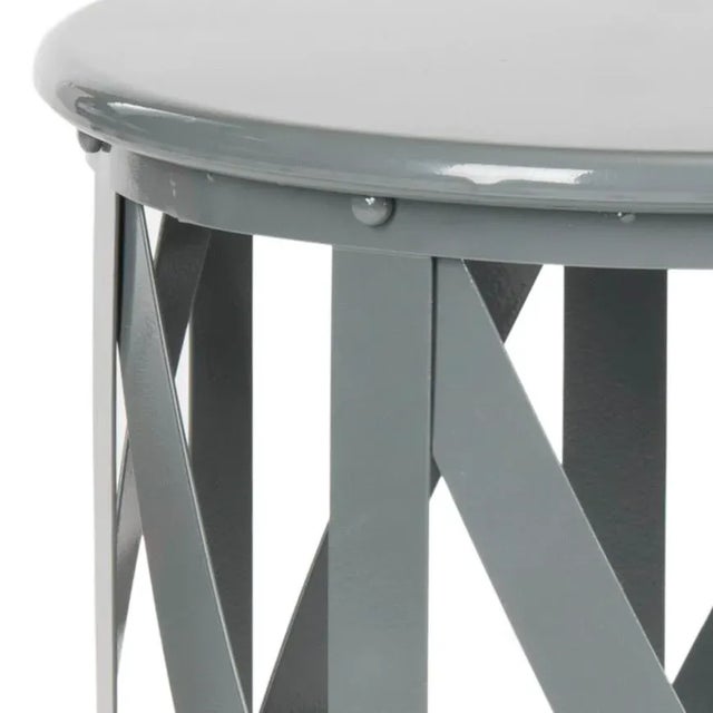 A bright and airy piece, the stool by is crafted of iron into a open lattice work design.Finished in high gloss grey, this...