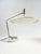 A rare table lamp designed by georges frydman around 1961 and produced by efa in nice during the 1960s. the lamp is...