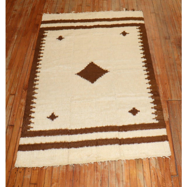Vintage Angora mohair wool rug in brown and ivory. Measures: 4'4'' x 6'9''.