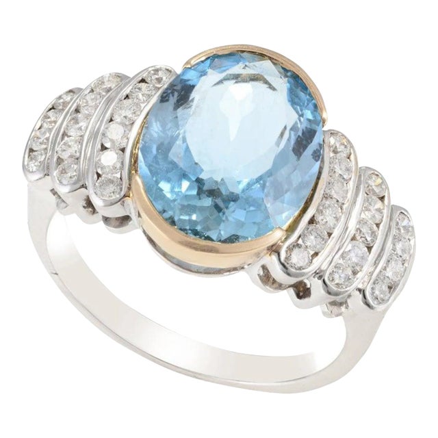 This is part of Chairish’s Fine Jewelry assortment. Art Deco Big Aquamarine and Diamond Ring in 18K Gold featuring natural...