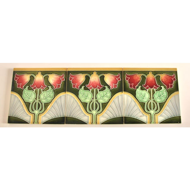 A beautiful original antique Art Nouveau tile with floral ornaments and stylized plants, dating from around 1900,...