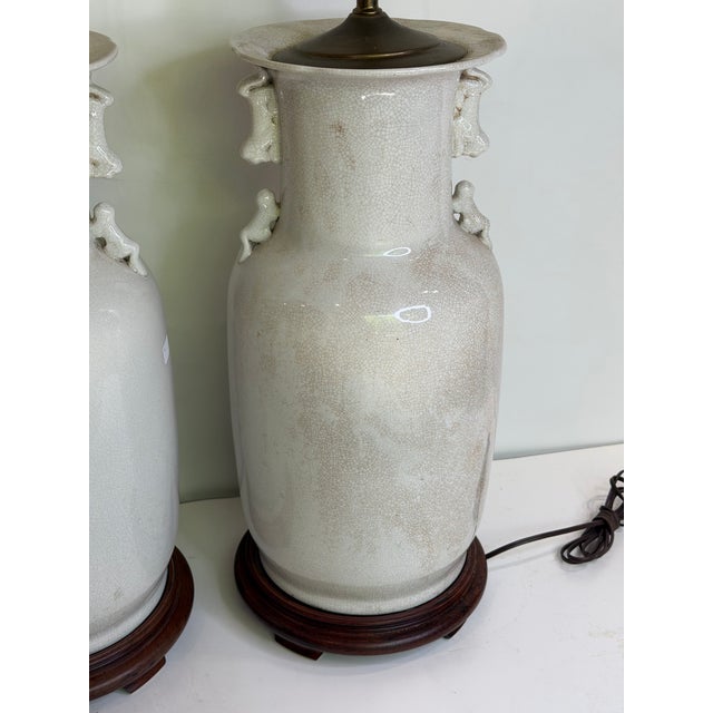 Vintage Large Chinese Blanc De Chine Crackle Glazed Porcelain Foo Dog Handle Table Lamps on Hardwood Bases a Pair For Sale - Image 4 of 11