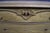Solid oak four-drawer dresser by Oakwood Interiors featuring a warm honey oak finish and hand-carved acorn and oak leaf...