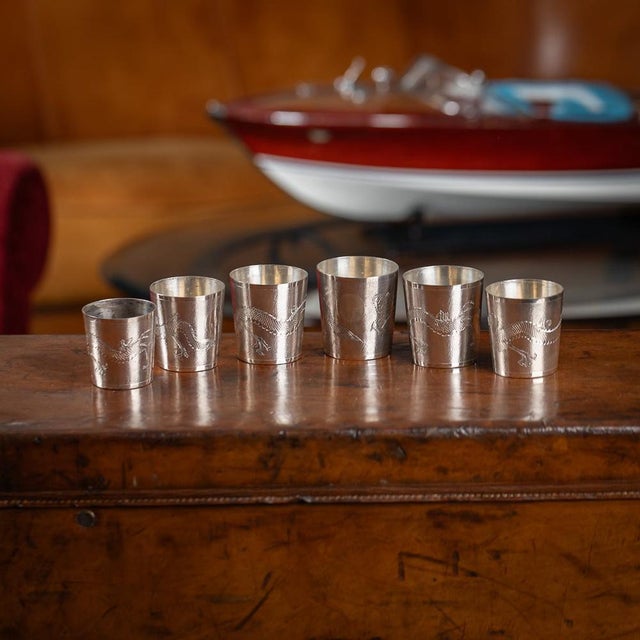 Antique 20th century chinese solid silver set of six stackable cased cups with leather pouch. The cups with a smooth top...
