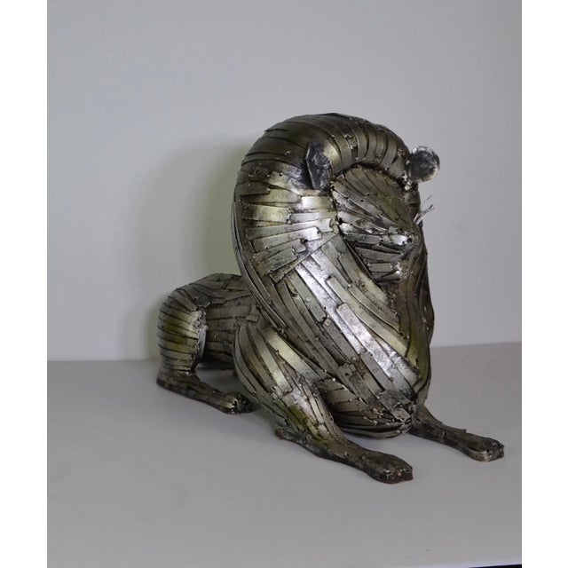 Metal lion sculpture each metal is soldered together.