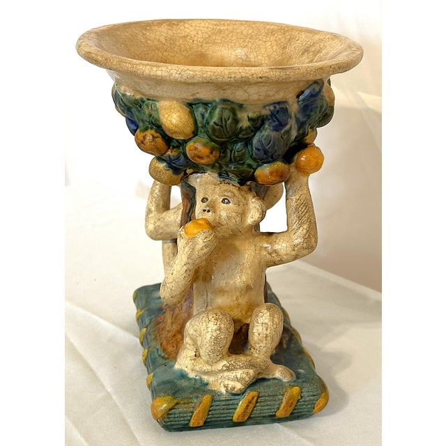 Precious vintage Majolica cachepot/ planter from the mid 20th century. It's made of ceramic and depicts monkeys under a...