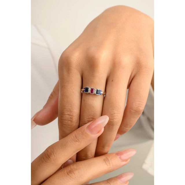 This is part of Chairish’s Fine Jewelry assortment. Unisex Blue Sapphire Ruby Unisex Wedding Band Ring Gift with Diamonds...