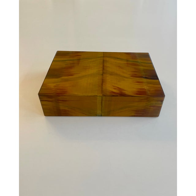 Tiger's eye box with green and red inclusions