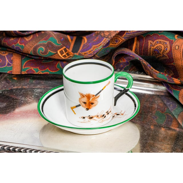 Indulge in the timeless elegance of this charming hunting country life theme antique demitasse cup and saucer. Crafted by...