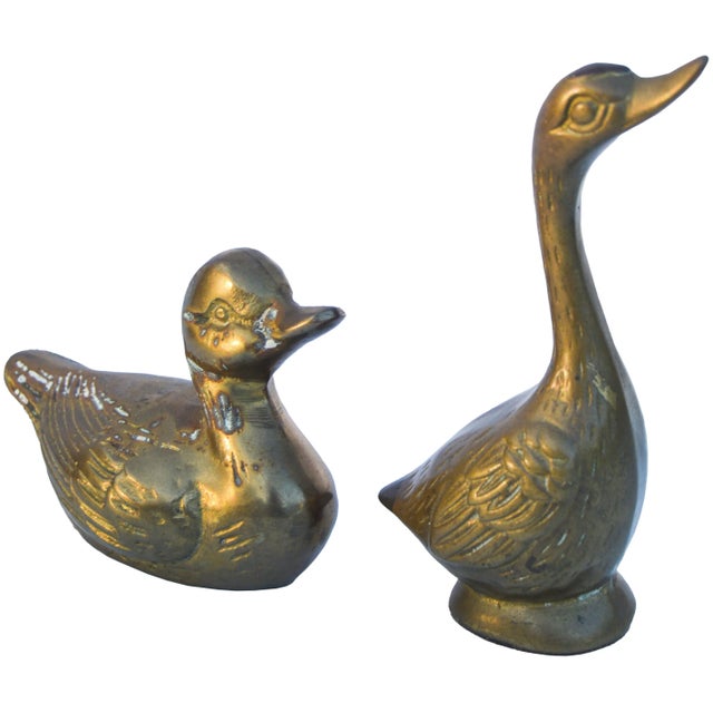 Pair of vintage solid brass ducklings. Featuring ornate details and natural patina. No maker's mark. Smallest, 3.5''L x...